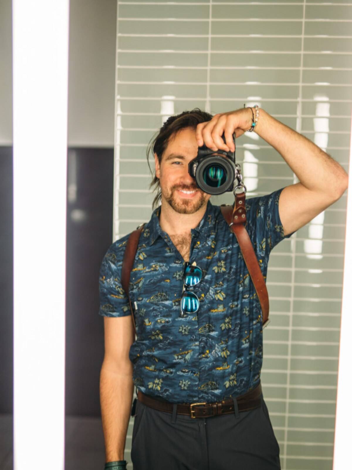 Photographer with a camera in studio light
