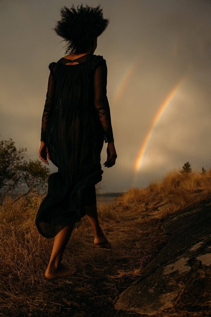 A second barefoot step through the Okanagan Lake trail as the rainbow holds over Okanagan Lake. print option