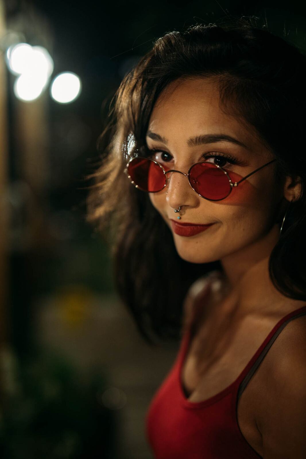 Angelica in Warm Shadow story frame 2: Warm shadow, red sunglasses, deck light and close portraits from an earlier session.