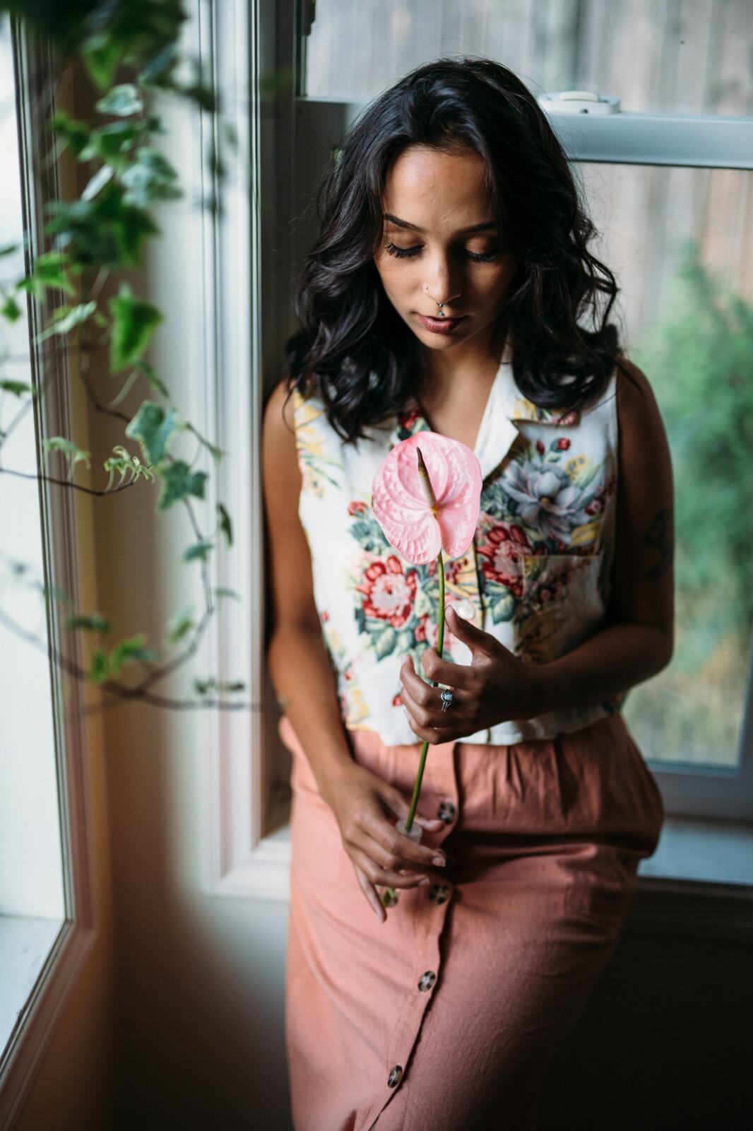 Angelica in Garden Light story frame 1: An earlier portrait story with garden colour, mirror play, straw-hat frames and window light.