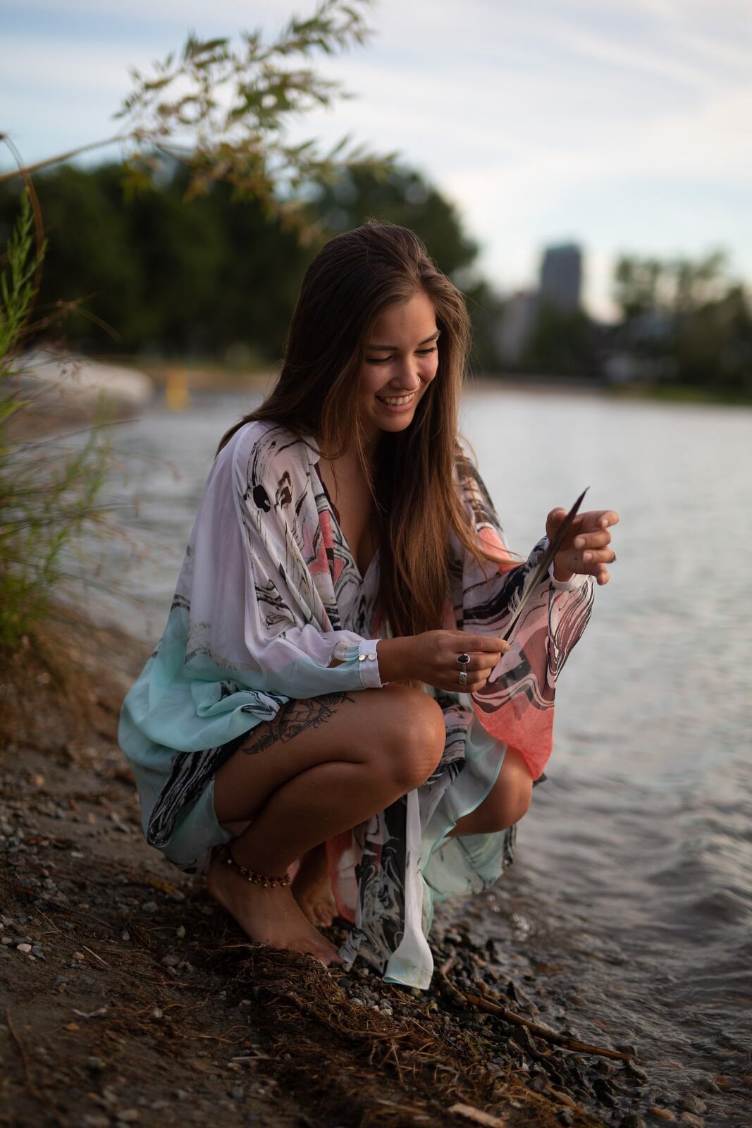 Chelsea by the Lake story frame 2: A 2019 portrait archive story with hat light, dusk water, travel warmth and easygoing lake-edge atmosphere.