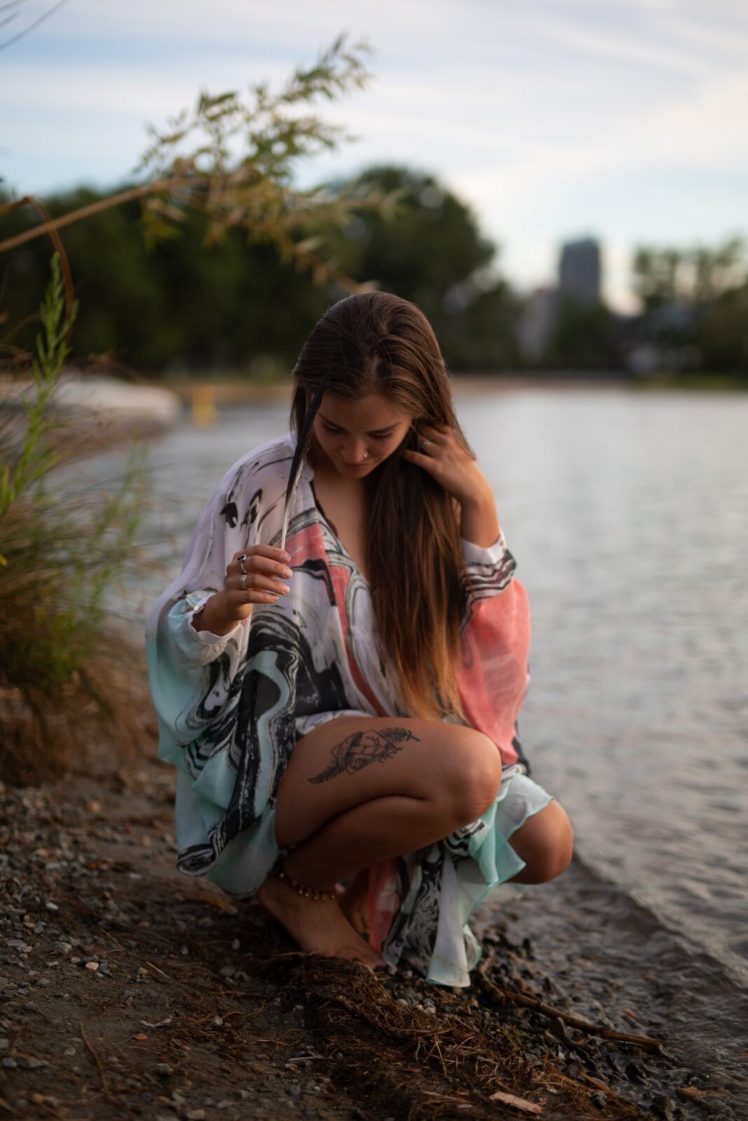 Chelsea by the Lake story frame 3: A 2019 portrait archive story with hat light, dusk water, travel warmth and easygoing lake-edge atmosphere.