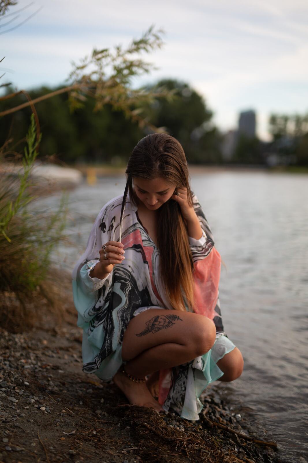 Chelsea by the Lake story frame 4: A 2019 portrait archive story with hat light, dusk water, travel warmth and easygoing lake-edge atmosphere.