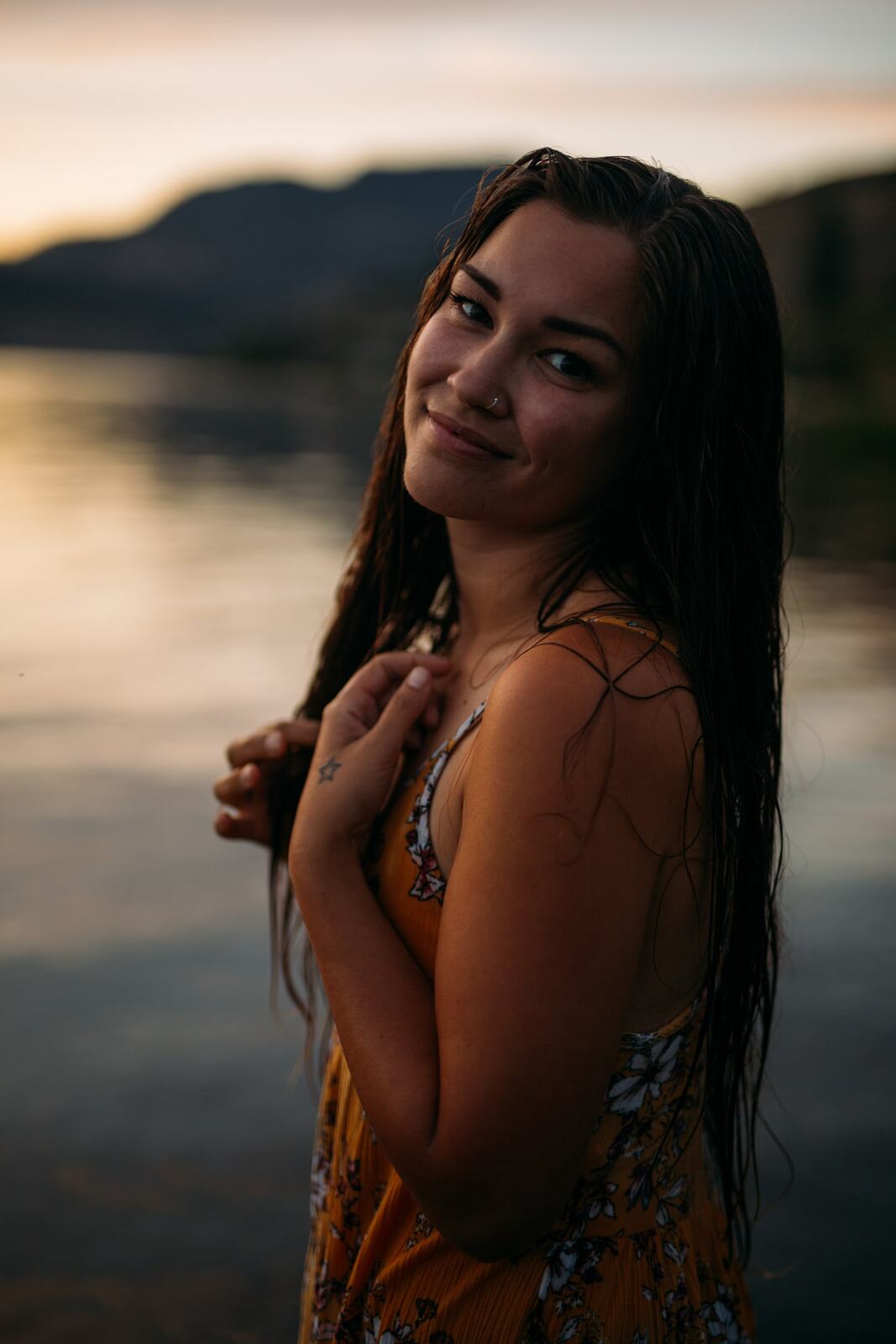 Chelsea by the Lake story frame 8: A 2019 portrait archive story with hat light, dusk water, travel warmth and easygoing lake-edge atmosphere.