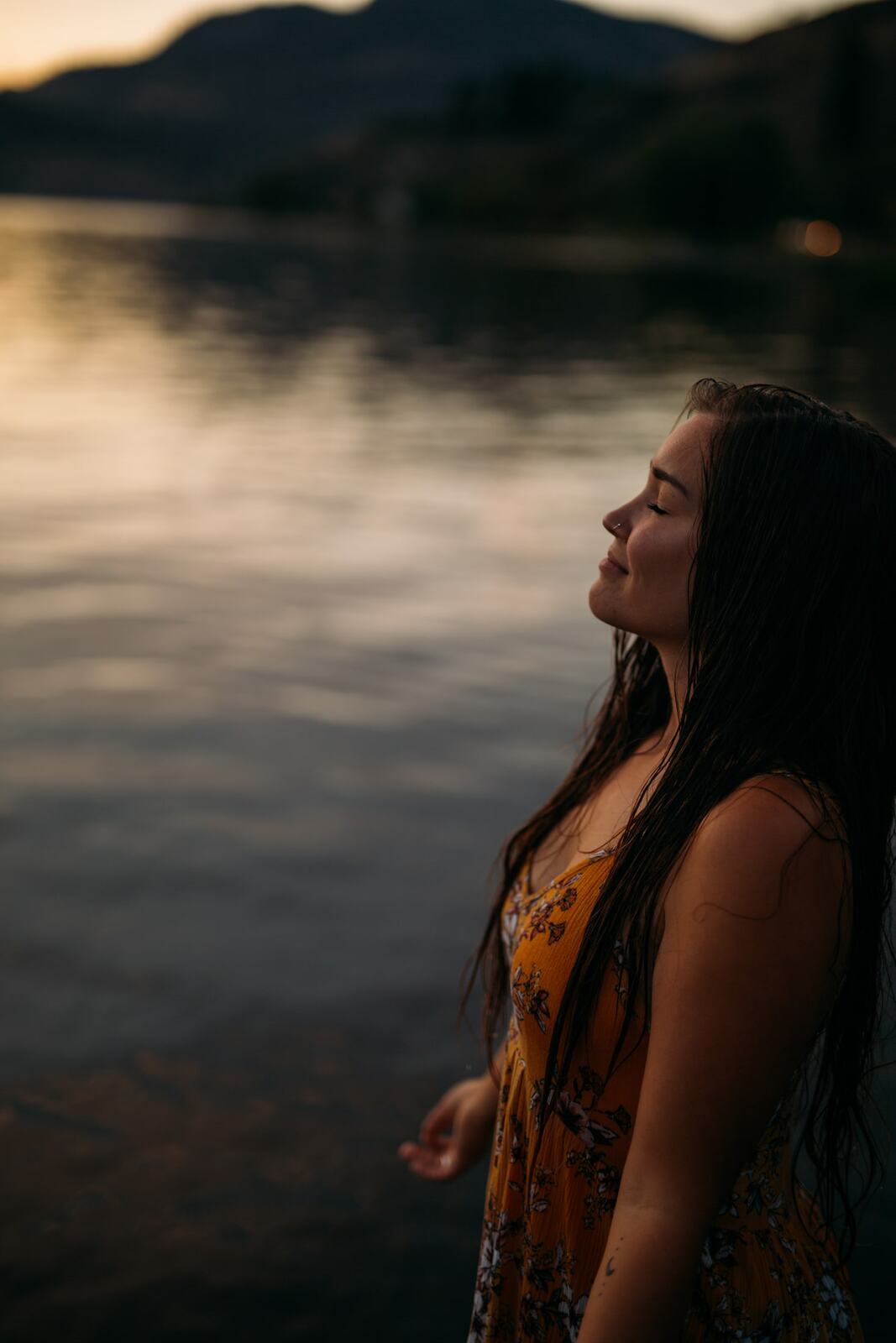 Chelsea by the Lake story frame 9: A 2019 portrait archive story with hat light, dusk water, travel warmth and easygoing lake-edge atmosphere.