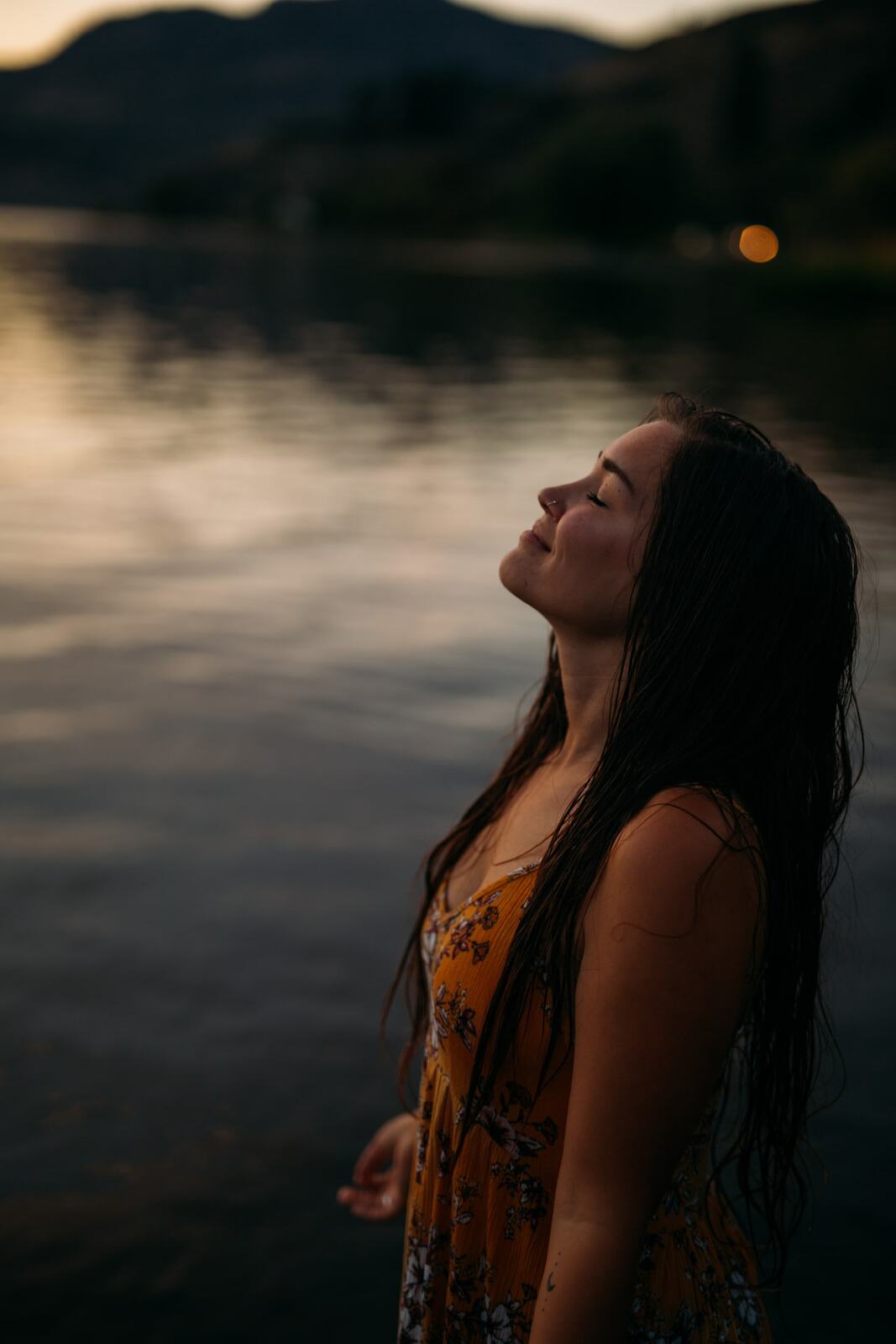 Chelsea by the Lake story frame 10: A 2019 portrait archive story with hat light, dusk water, travel warmth and easygoing lake-edge atmosphere.