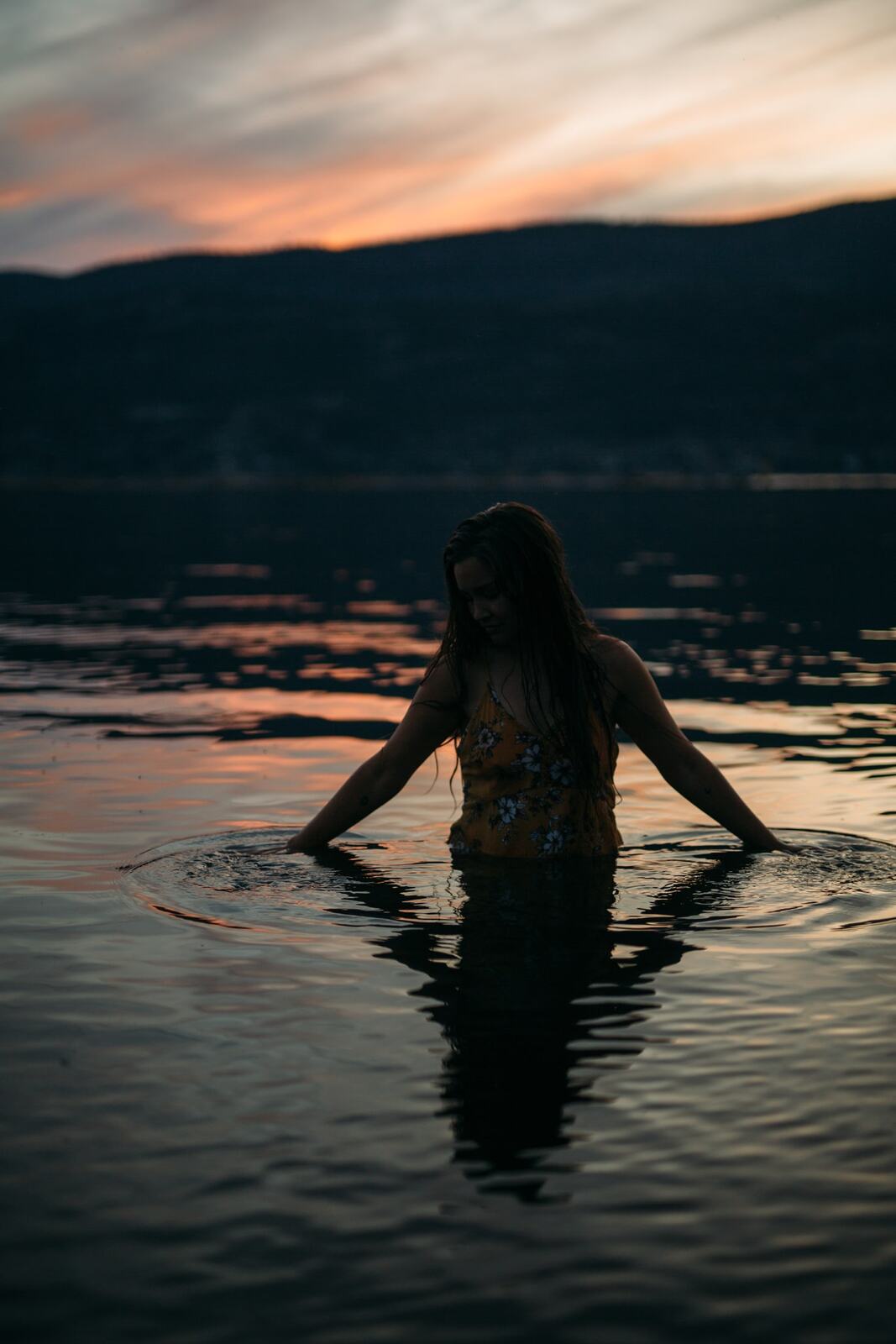 Chelsea by the Lake story frame 7: A 2019 portrait archive story with hat light, dusk water, travel warmth and easygoing lake-edge atmosphere.