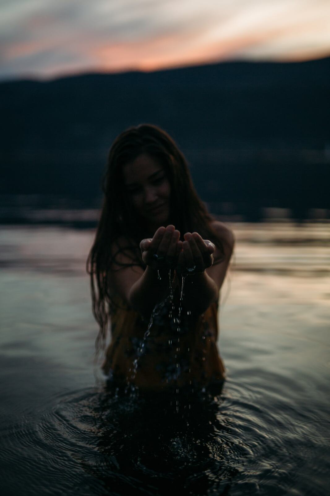 Chelsea by the Lake story frame 13: A 2019 portrait archive story with hat light, dusk water, travel warmth and easygoing lake-edge atmosphere.