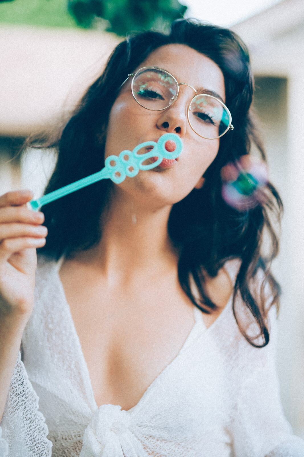 Mel, Summer 2019 story frame 2: A 2019 portrait archive story with bubbles, reeds, glasses and warm dusk colour.