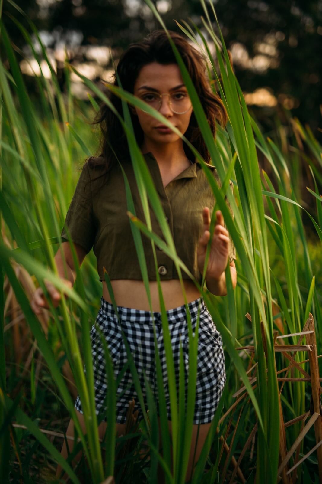 Mel, Summer 2019 story frame 4: A 2019 portrait archive story with bubbles, reeds, glasses and warm dusk colour.