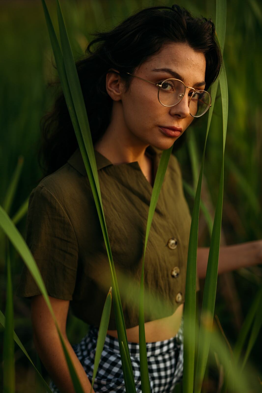 Mel, Summer 2019 story frame 5: A 2019 portrait archive story with bubbles, reeds, glasses and warm dusk colour.
