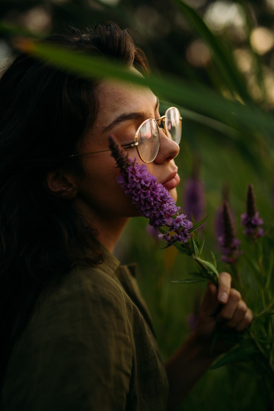 Mel, Summer 2019 story frame 6: A 2019 portrait archive story with bubbles, reeds, glasses and warm dusk colour.