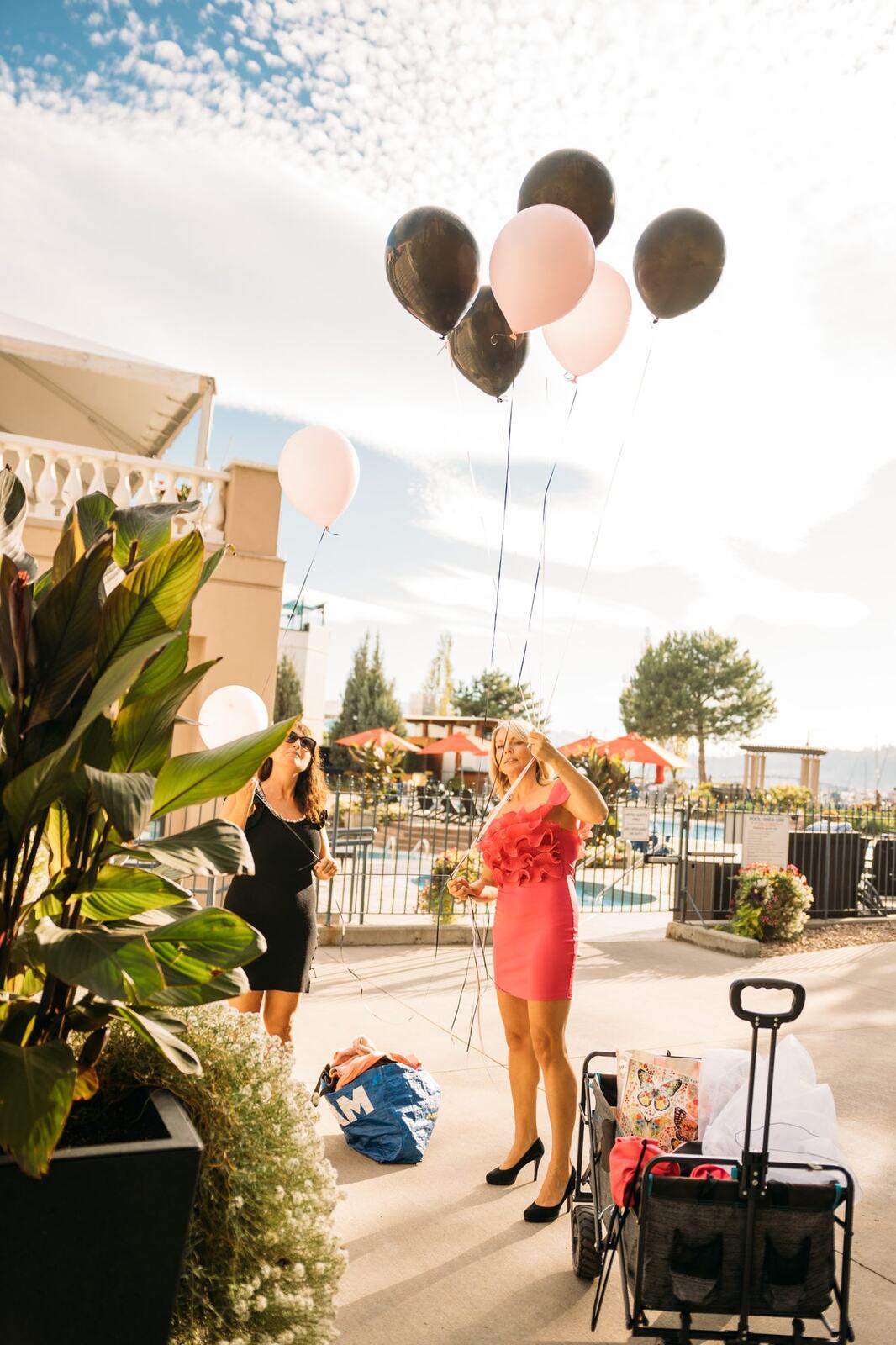 Let's Not Sugarcoat It, Fall corporate story frame 8: A brighter business-portrait set for Let's Not Sugarcoat It: balloons, pink dress, sunglasses, cups and a public voice with more charge..