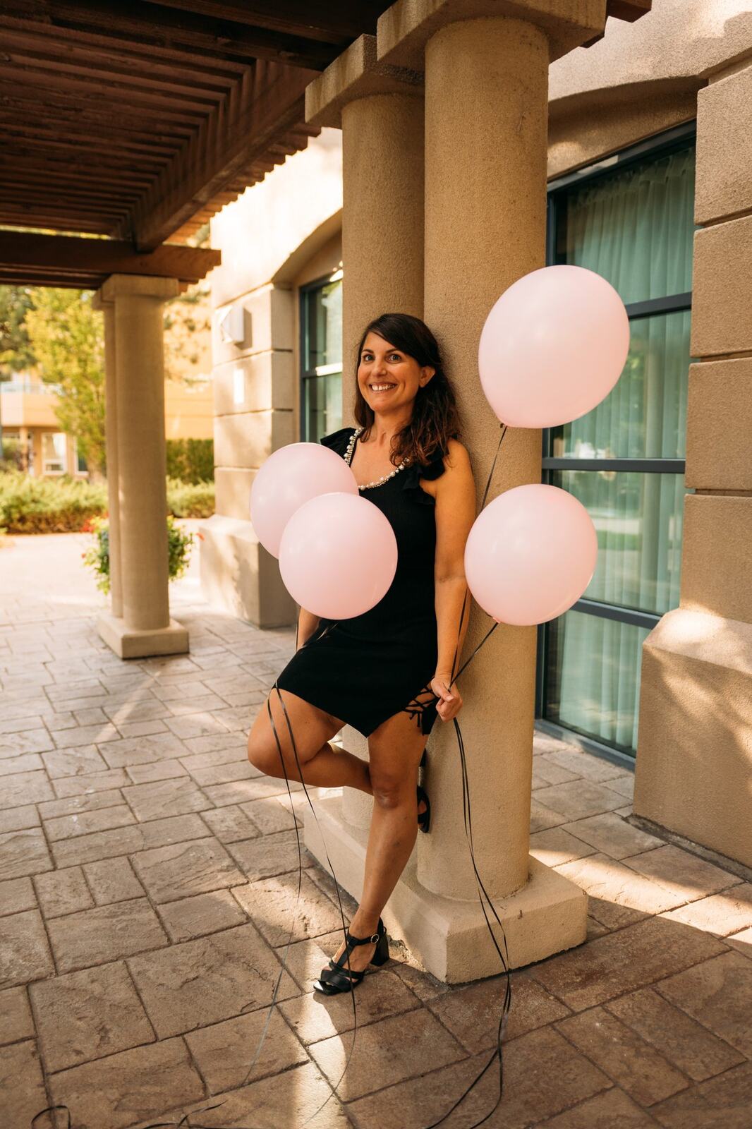 Let's Not Sugarcoat It, Fall corporate story frame 10: A brighter business-portrait set for Let's Not Sugarcoat It: balloons, pink dress, sunglasses, cups and a public voice with more charge..
