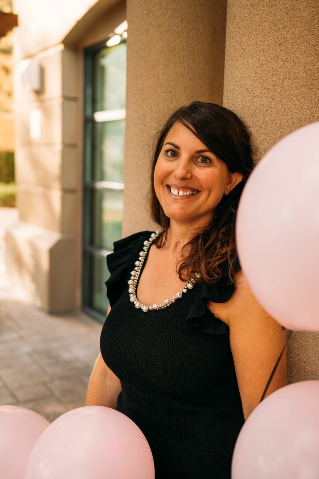 Let's Not Sugarcoat It, Fall corporate story frame 11: A brighter business-portrait set for Let's Not Sugarcoat It: balloons, pink dress, sunglasses, cups and a public voice with more charge..