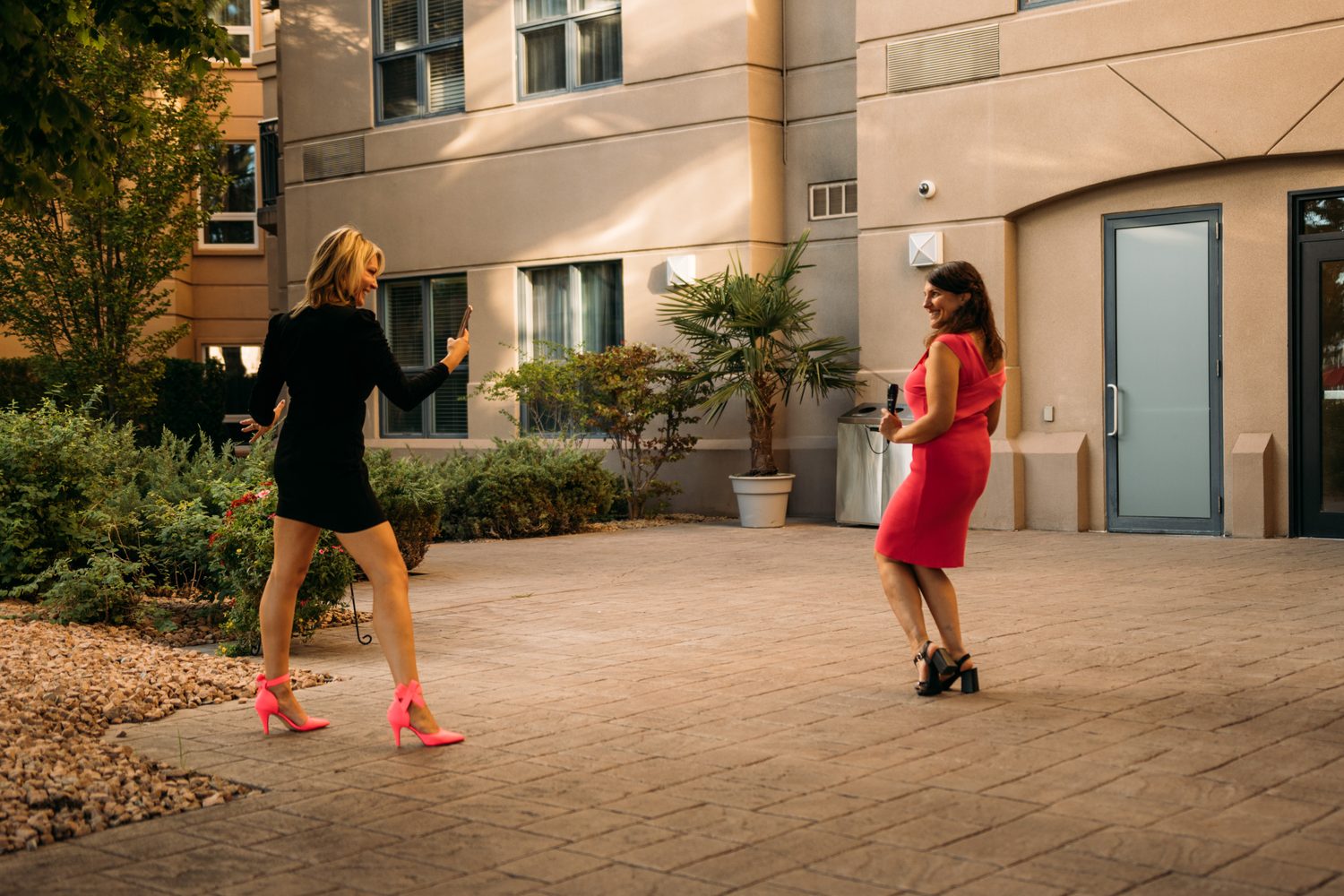 Let's Not Sugarcoat It, Fall corporate story frame 22: A brighter business-portrait set for Let's Not Sugarcoat It: balloons, pink dress, sunglasses, cups and a public voice with more charge..