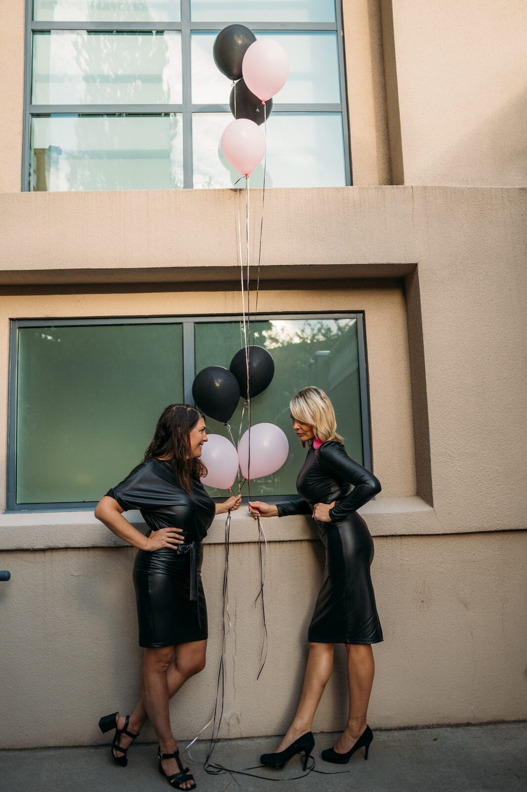 Let's Not Sugarcoat It, Fall corporate story frame 28: A brighter business-portrait set for Let's Not Sugarcoat It: balloons, pink dress, sunglasses, cups and a public voice with more charge..