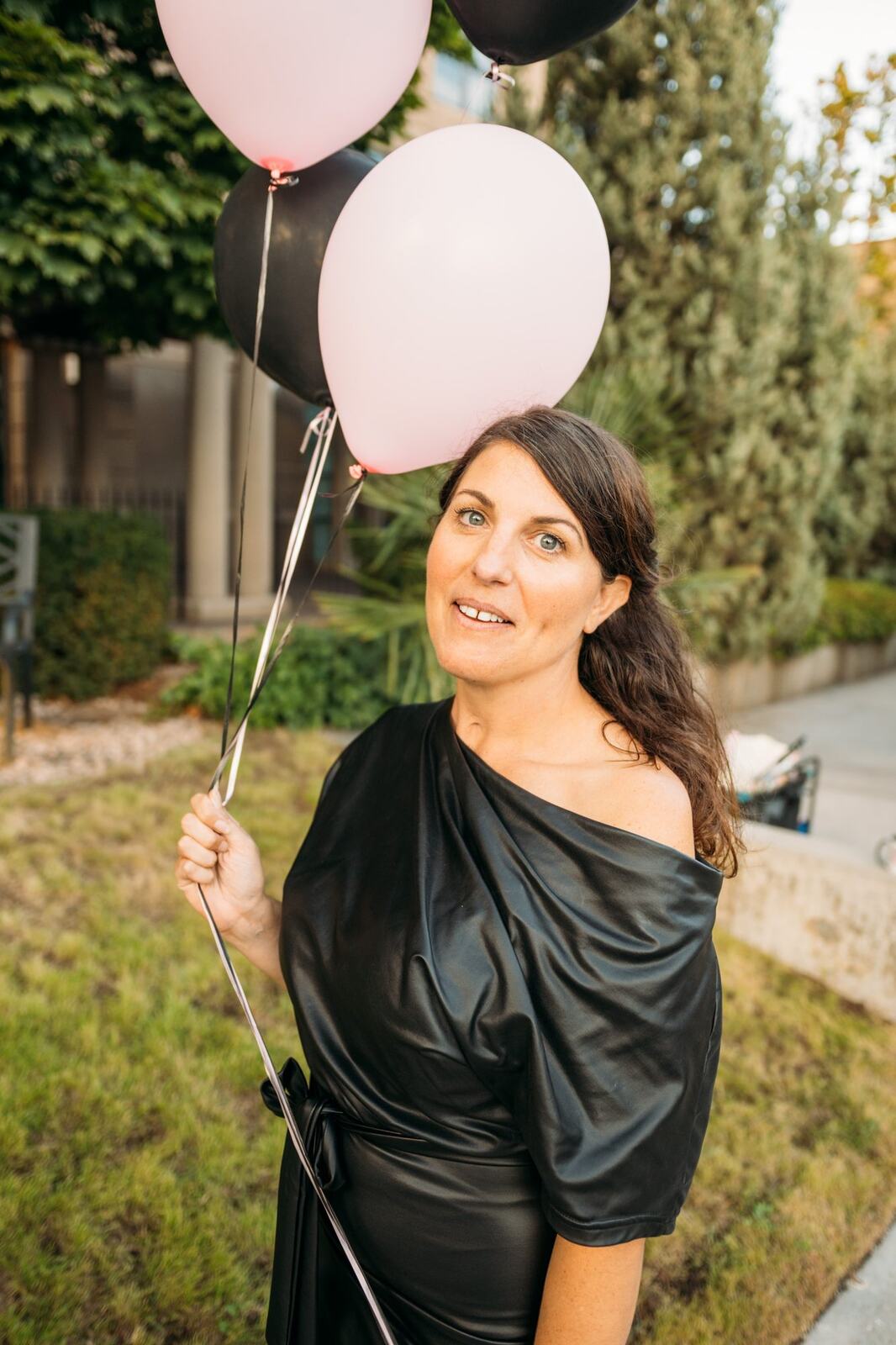 Let's Not Sugarcoat It, Fall corporate story frame 29: A brighter business-portrait set for Let's Not Sugarcoat It: balloons, pink dress, sunglasses, cups and a public voice with more charge..