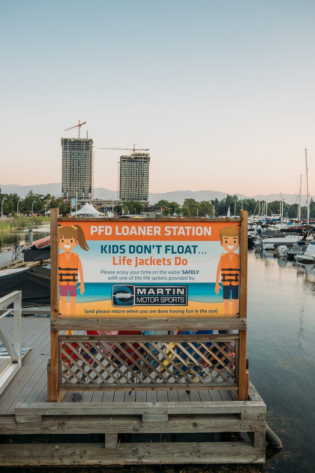 Let's Not Sugarcoat It, Summer corporate story frame 34: A summer business-portrait set for Let's Not Sugarcoat It: docks, colour, boat light and two women making room for conversations that are direct, raw and public..