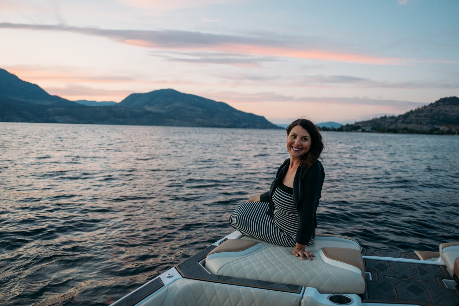 Let's Not Sugarcoat It, Summer corporate story frame 39: A summer business-portrait set for Let's Not Sugarcoat It: docks, colour, boat light and two women making room for conversations that are direct, raw and public..