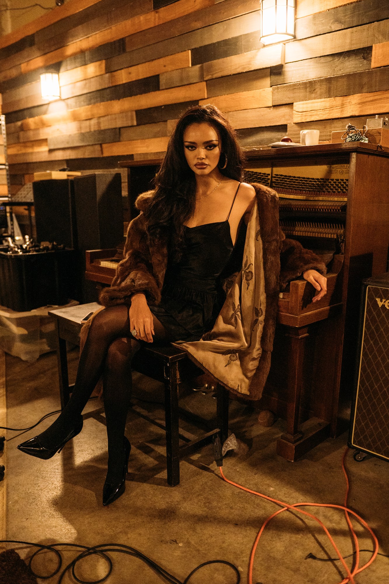 Music Studio Portraits: Frontal portrait in the warm wood room.