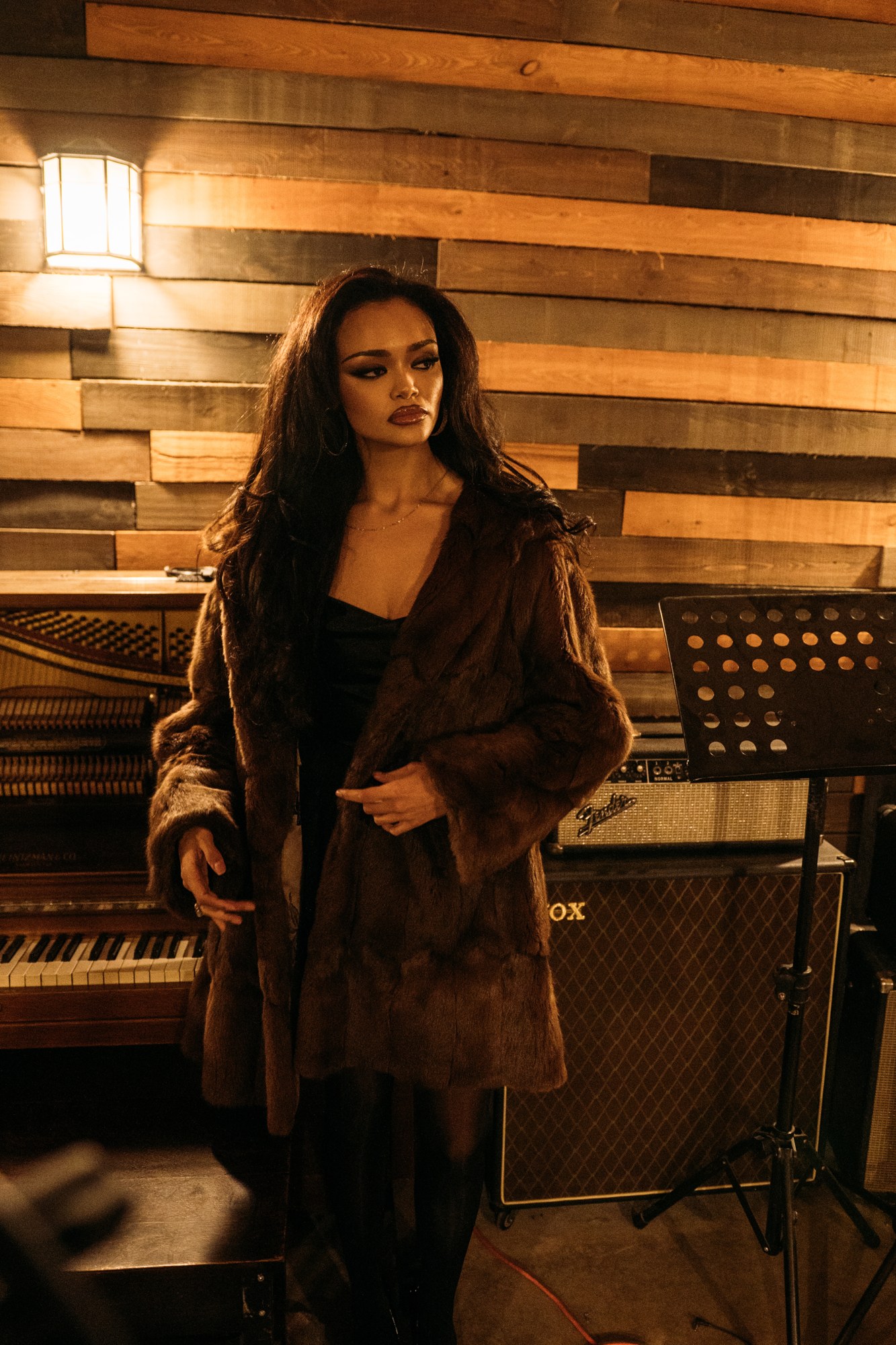 Music Studio Portraits: Full standing portrait in the wrapped jacket.