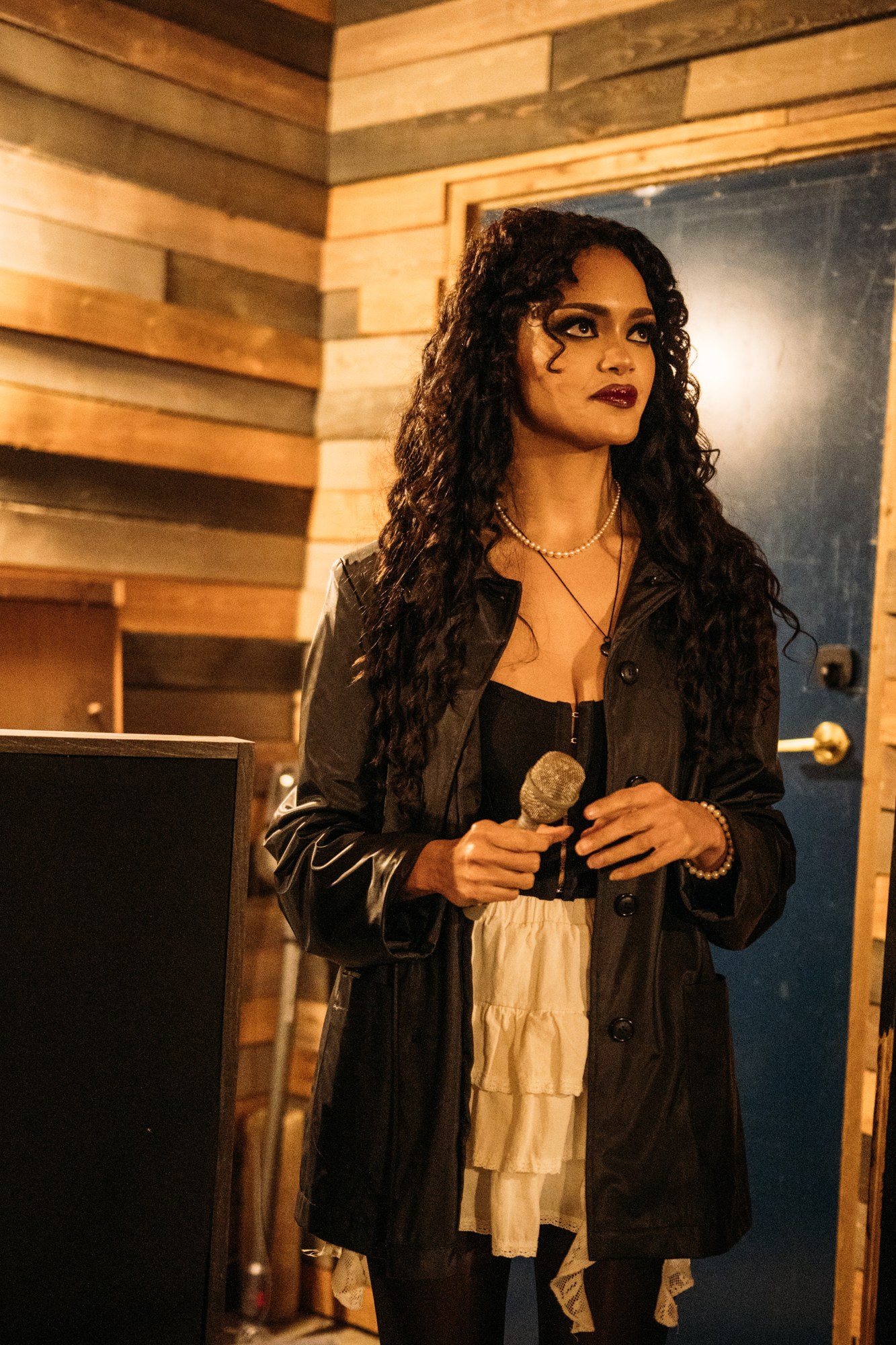 Inside the Recording Studio: Solo portrait in the warm wood room.