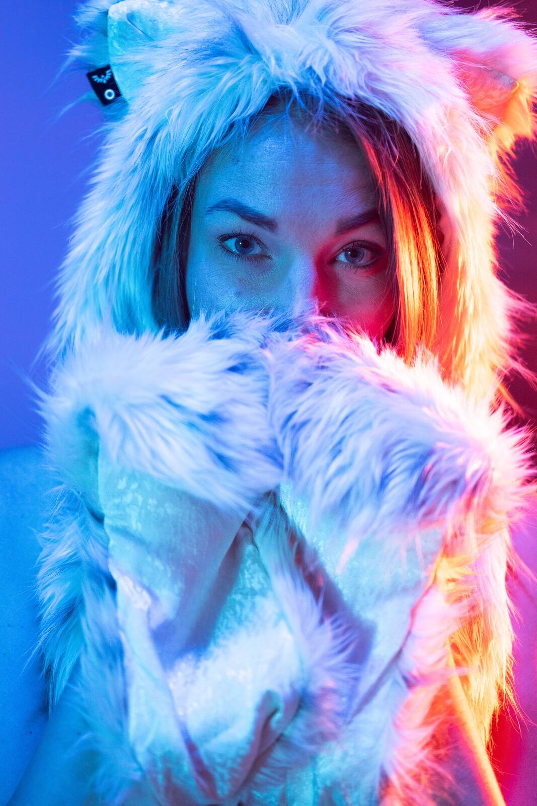 Angela in Colour portraits story frame 9: Angela in a colourful studio portrait set with clean expression, styled wardrobe, controlled light and a polished creative-portrait feel.