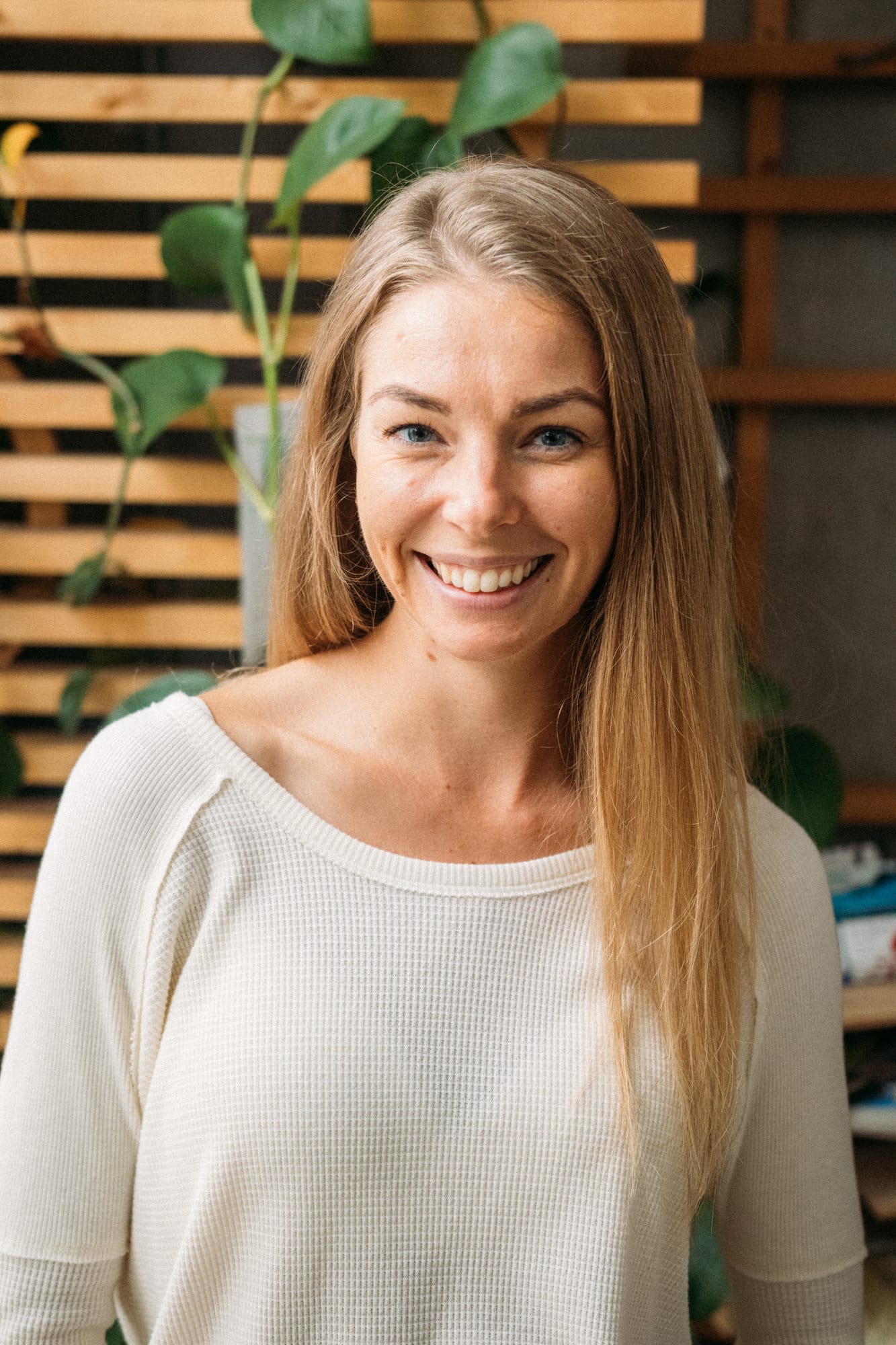 Angela at Float Space portraits story frame 6: A Float Space portrait set that moves from clean wellness headshots into red low-key portraits, skin, shadow and close detail..