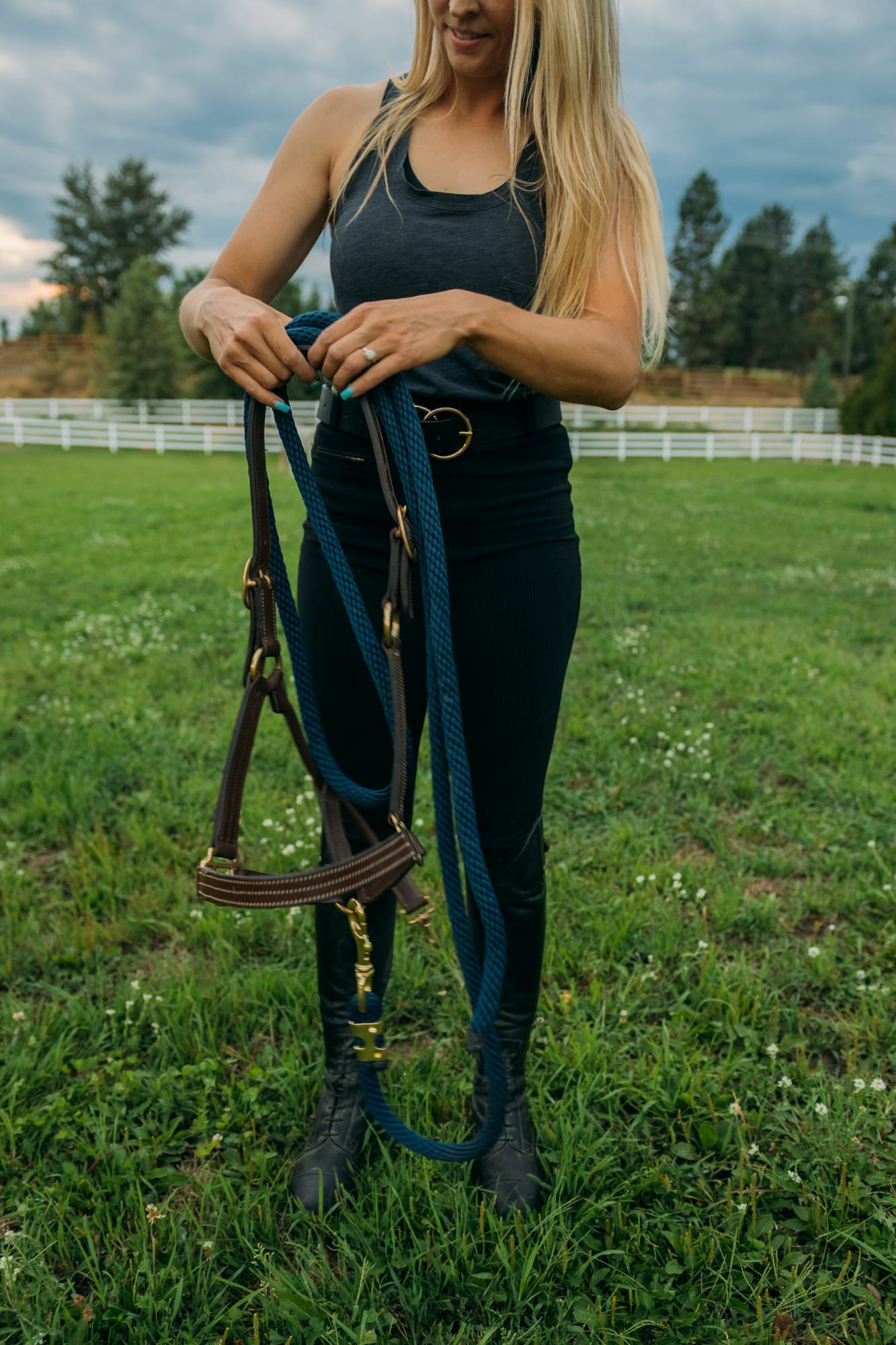 Ashton at the Ranch portraits story frame 6: Ranch portraits for Ashton in Kelowna, with horses, open pasture, quiet country styling and Okanagan light shaped into a grounded portrait story.