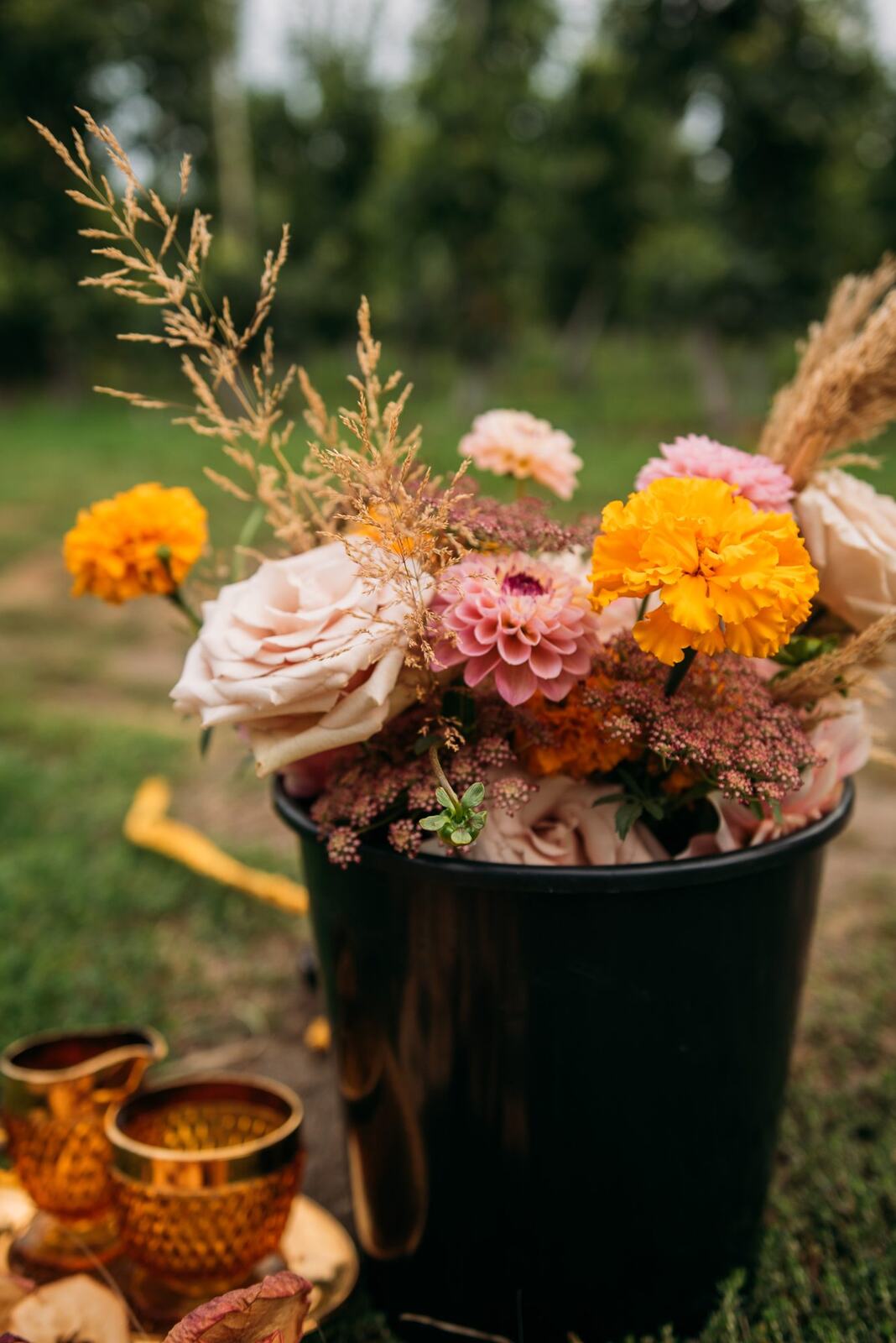 Bailley of Gems & Stems corporate story frame 2: Brand photography for Bailley of Gems & Stems in Oliver, BC, with flowers, owner portraits, Eastside signage, shop details and warm maker-led business imagery..