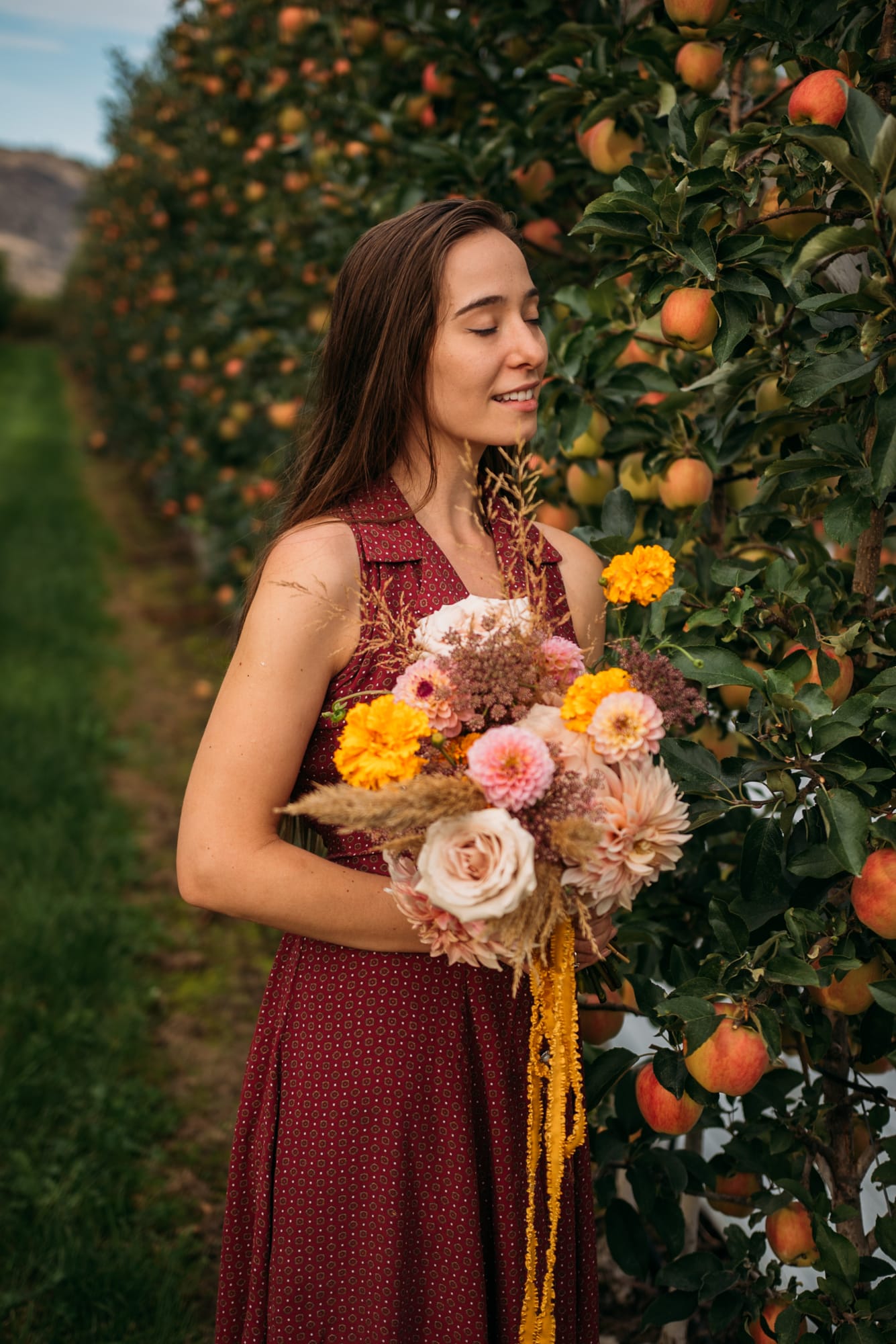 Bailley of Gems & Stems corporate story frame 7: Brand photography for Bailley of Gems & Stems in Oliver, BC, with flowers, owner portraits, Eastside signage, shop details and warm maker-led business imagery..