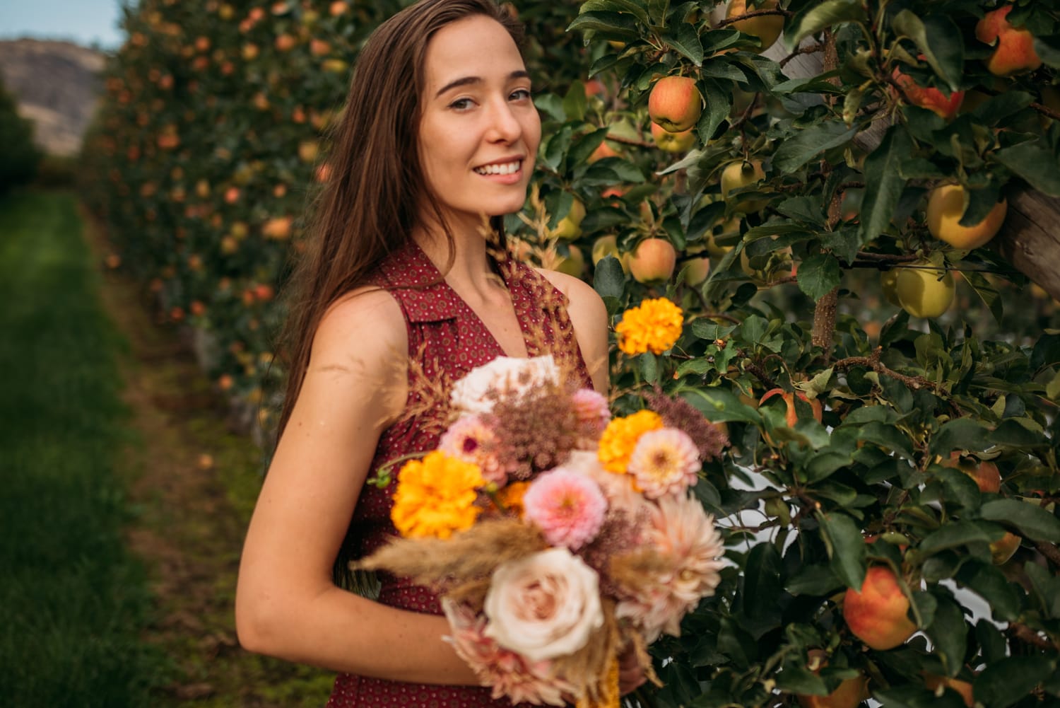 Bailley of Gems & Stems corporate story frame 8: Brand photography for Bailley of Gems & Stems in Oliver, BC, with flowers, owner portraits, Eastside signage, shop details and warm maker-led business imagery..