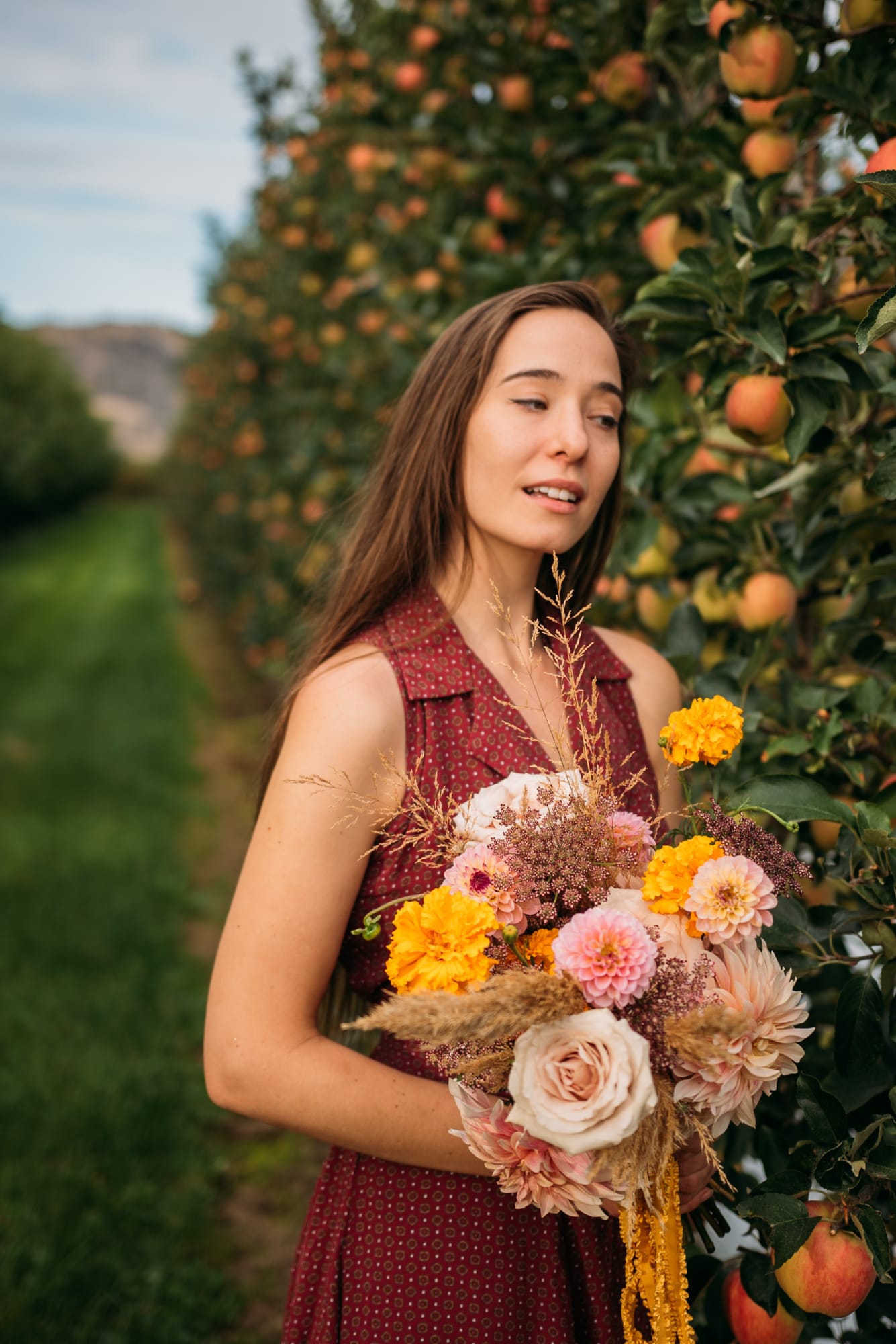 Bailley of Gems & Stems corporate story frame 9: Brand photography for Bailley of Gems & Stems in Oliver, BC, with flowers, owner portraits, Eastside signage, shop details and warm maker-led business imagery..