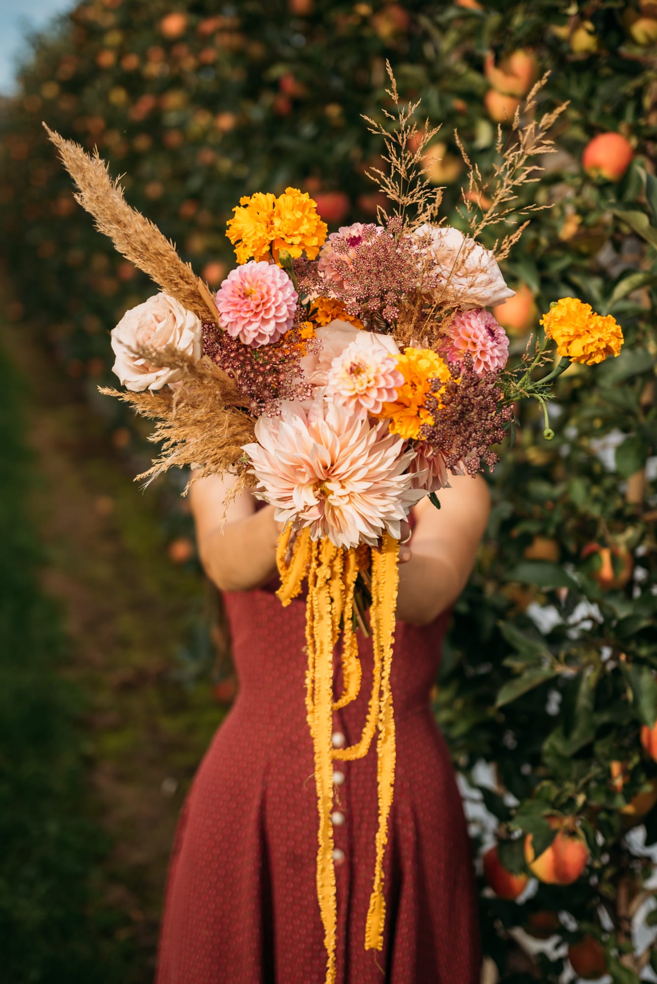 Bailley of Gems & Stems corporate story frame 10: Brand photography for Bailley of Gems & Stems in Oliver, BC, with flowers, owner portraits, Eastside signage, shop details and warm maker-led business imagery..