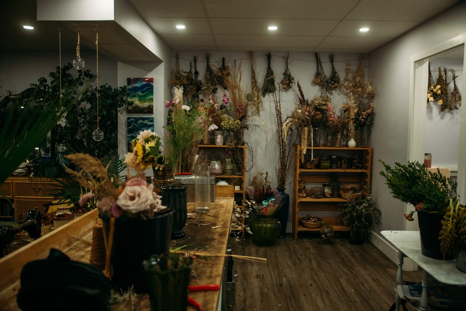 Bailley of Gems & Stems corporate story frame 24: Brand photography for Bailley of Gems & Stems in Oliver, BC, with flowers, owner portraits, Eastside signage, shop details and warm maker-led business imagery..