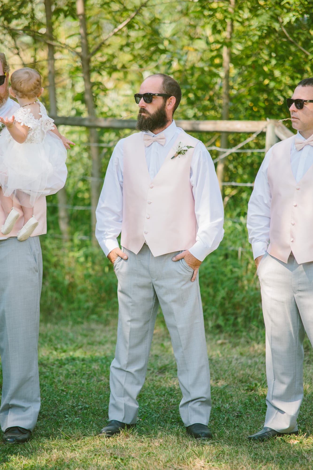 Barbara and Ryan weddings story frame 15: A Salmon Arm wedding near Mount Ida, moving from a private yard to Marine Peace Park and wharf portraits, with the groom's trucking life part of the story..