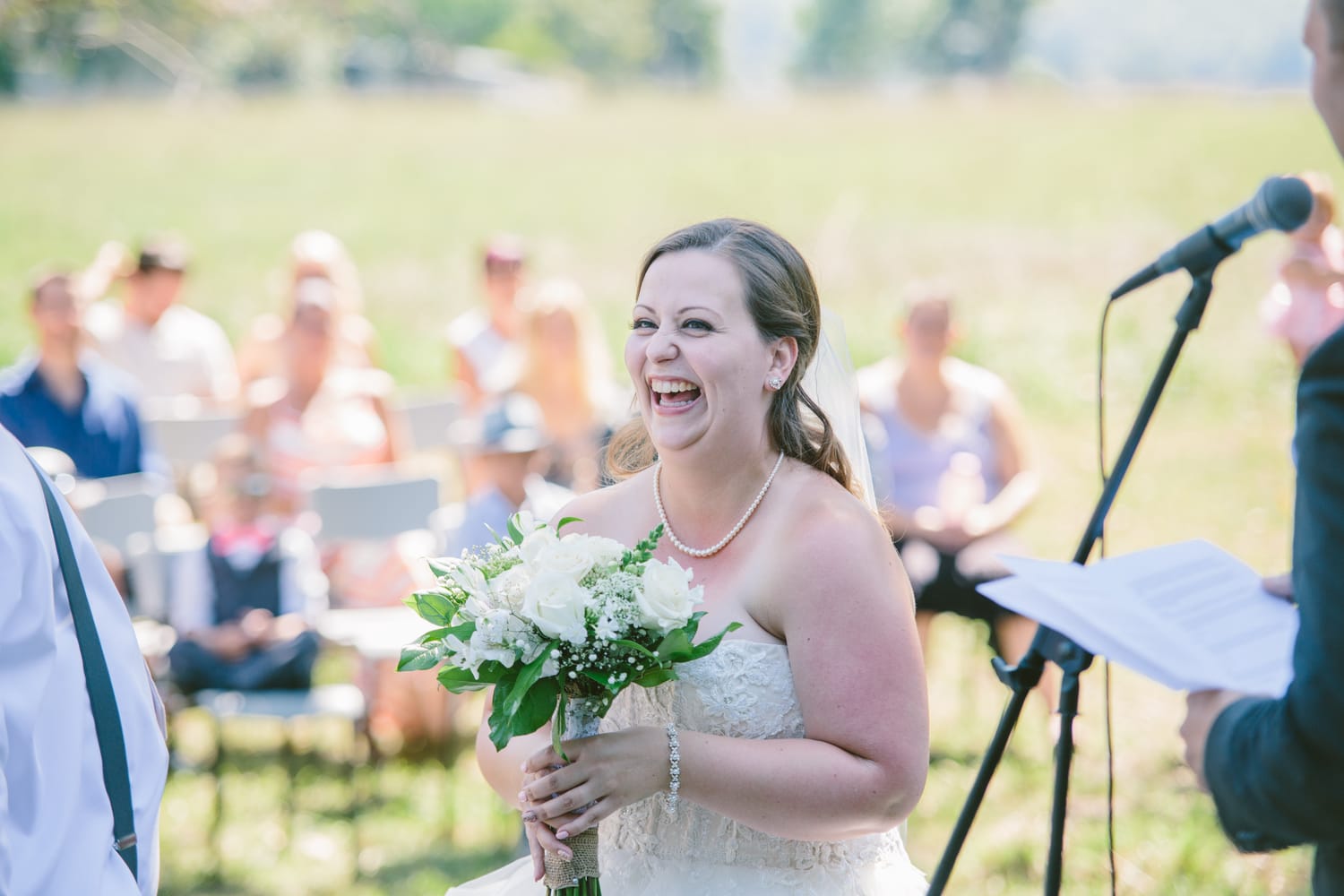 Barbara and Ryan weddings story frame 16: A Salmon Arm wedding near Mount Ida, moving from a private yard to Marine Peace Park and wharf portraits, with the groom's trucking life part of the story..