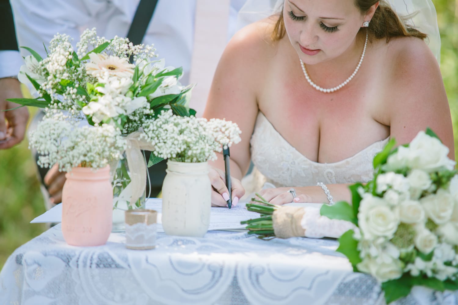 Barbara and Ryan weddings story frame 19: A Salmon Arm wedding near Mount Ida, moving from a private yard to Marine Peace Park and wharf portraits, with the groom's trucking life part of the story..