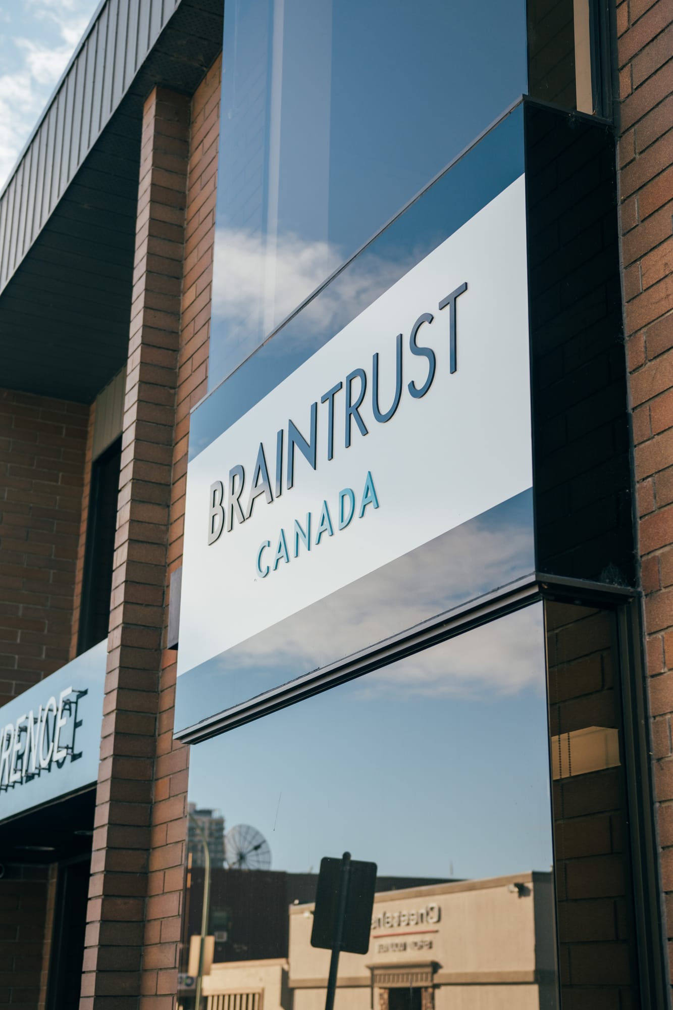 BrainTrust Canada Office corporate story frame 2: Office, team and location photography for BrainTrust Canada in Kelowna, with building images, group photos, staff portraits and interior details for local communications..