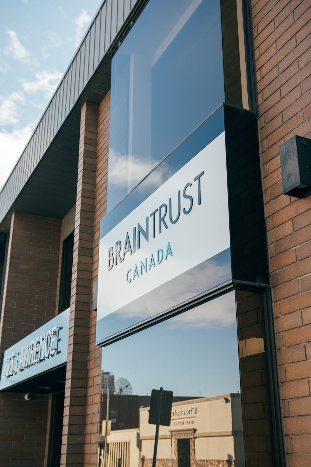 BrainTrust Canada Office corporate story frame 24: Office, team and location photography for BrainTrust Canada in Kelowna, with building images, group photos, staff portraits and interior details for local communications..