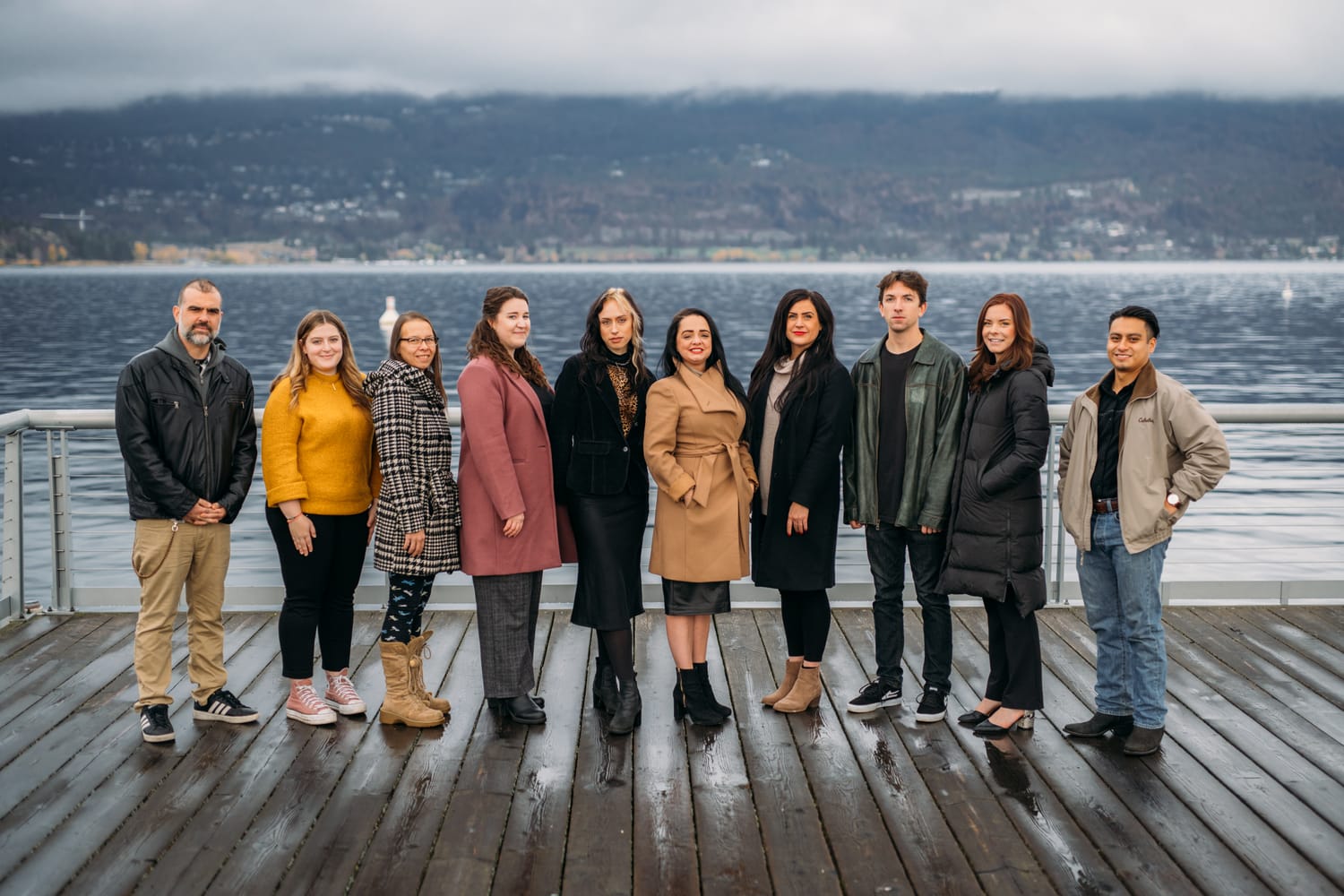 BrainTrust Canada Waterfront corporate story frame 2: Waterfront team and brand portraits for BrainTrust Canada in Kelowna, built around group photos, walking images and approachable nonprofit profile photography..