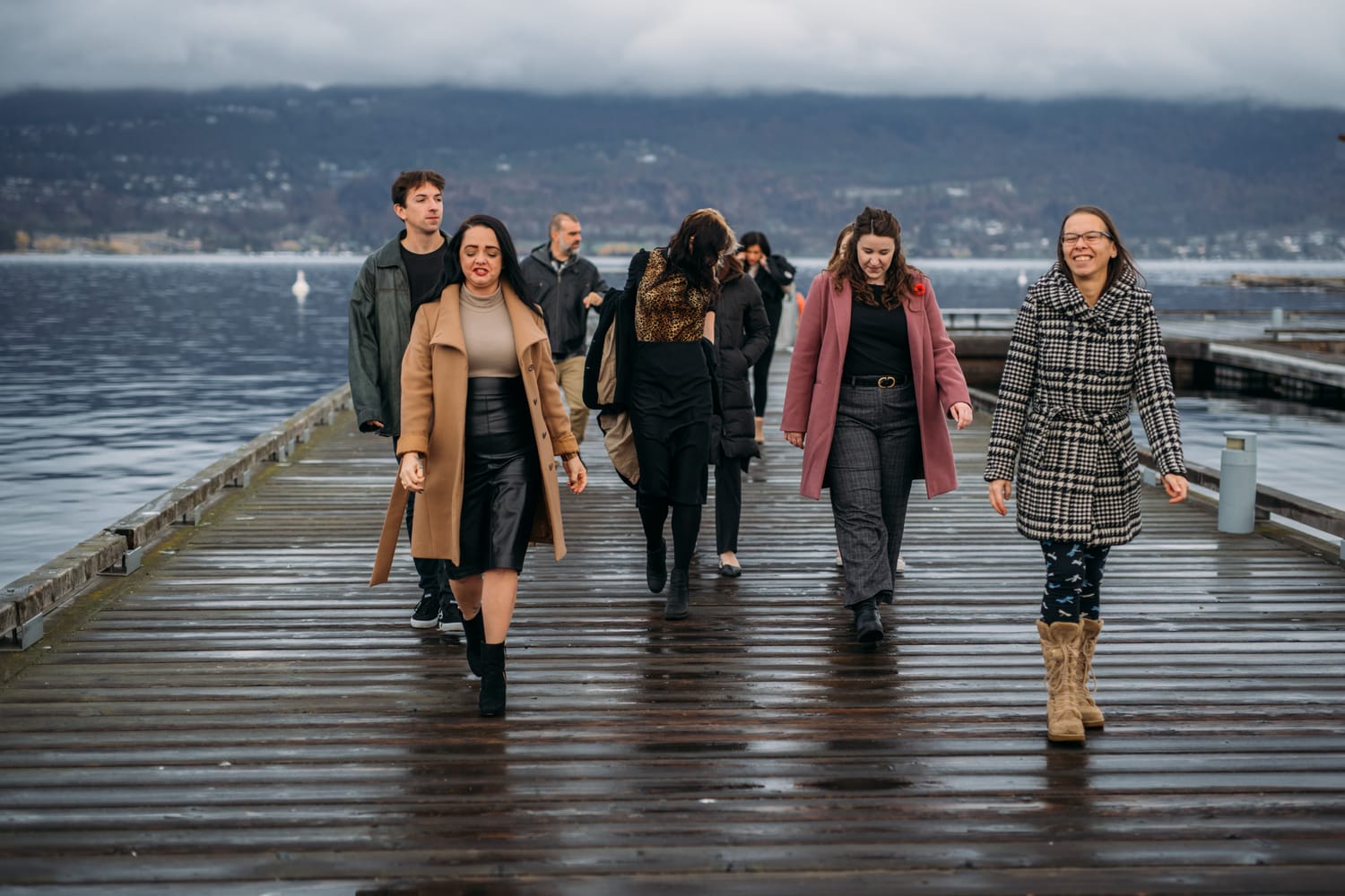 BrainTrust Canada Waterfront corporate story frame 10: Waterfront team and brand portraits for BrainTrust Canada in Kelowna, built around group photos, walking images and approachable nonprofit profile photography..