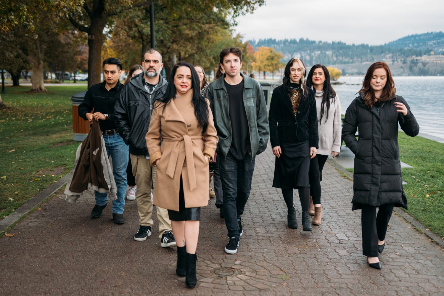 BrainTrust Canada Waterfront corporate story frame 18: Waterfront team and brand portraits for BrainTrust Canada in Kelowna, built around group photos, walking images and approachable nonprofit profile photography..