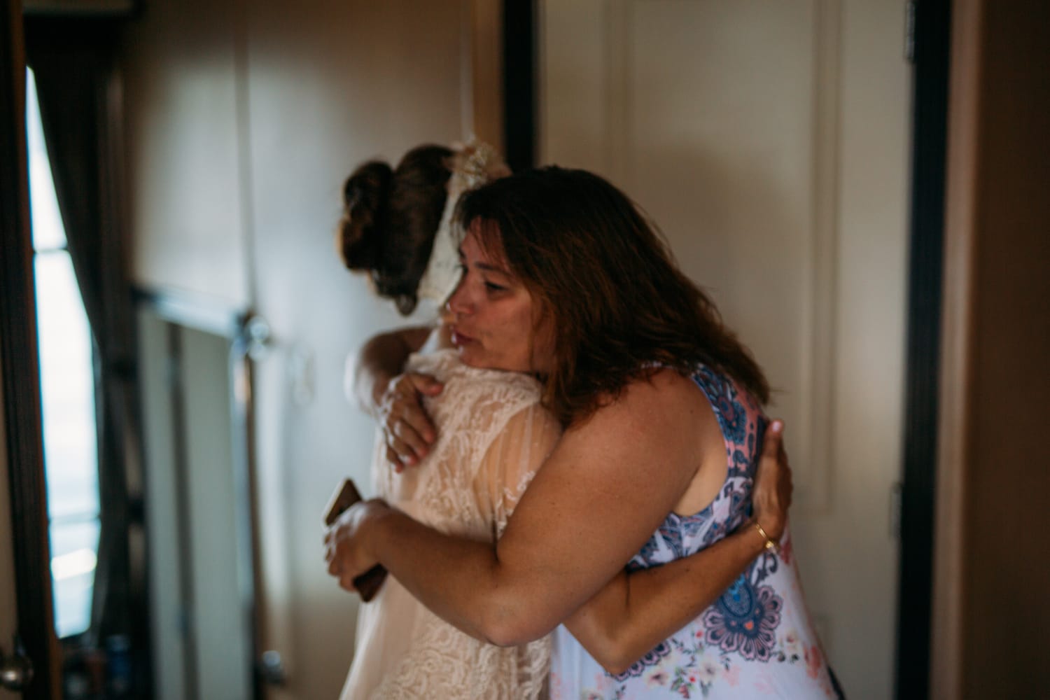 Carmel and Chris weddings story frame 13: A Sicamous and Shuswap Lake houseboat wedding that moved from water to beach, with friend-community overlap and a relaxed lakeside feeling..