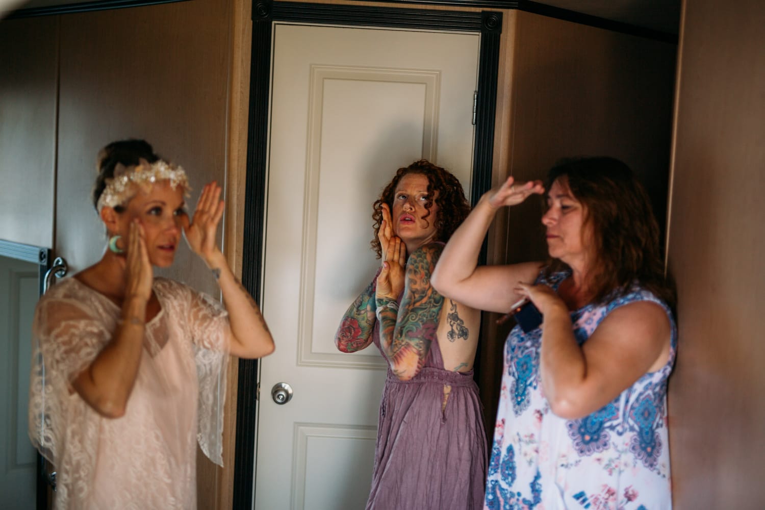 Carmel and Chris weddings story frame 14: A Sicamous and Shuswap Lake houseboat wedding that moved from water to beach, with friend-community overlap and a relaxed lakeside feeling..