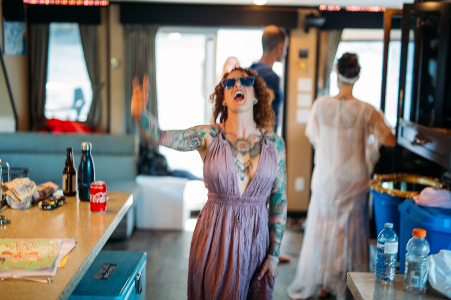 Carmel and Chris weddings story frame 15: A Sicamous and Shuswap Lake houseboat wedding that moved from water to beach, with friend-community overlap and a relaxed lakeside feeling..