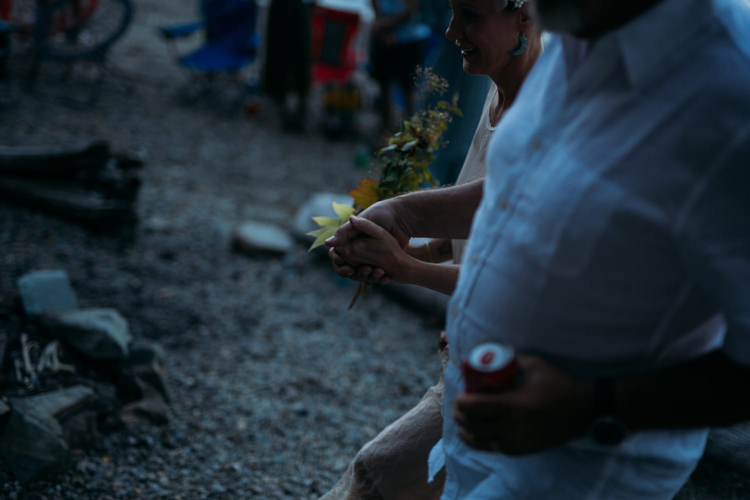 Carmel and Chris weddings story frame 17: A Sicamous and Shuswap Lake houseboat wedding that moved from water to beach, with friend-community overlap and a relaxed lakeside feeling..