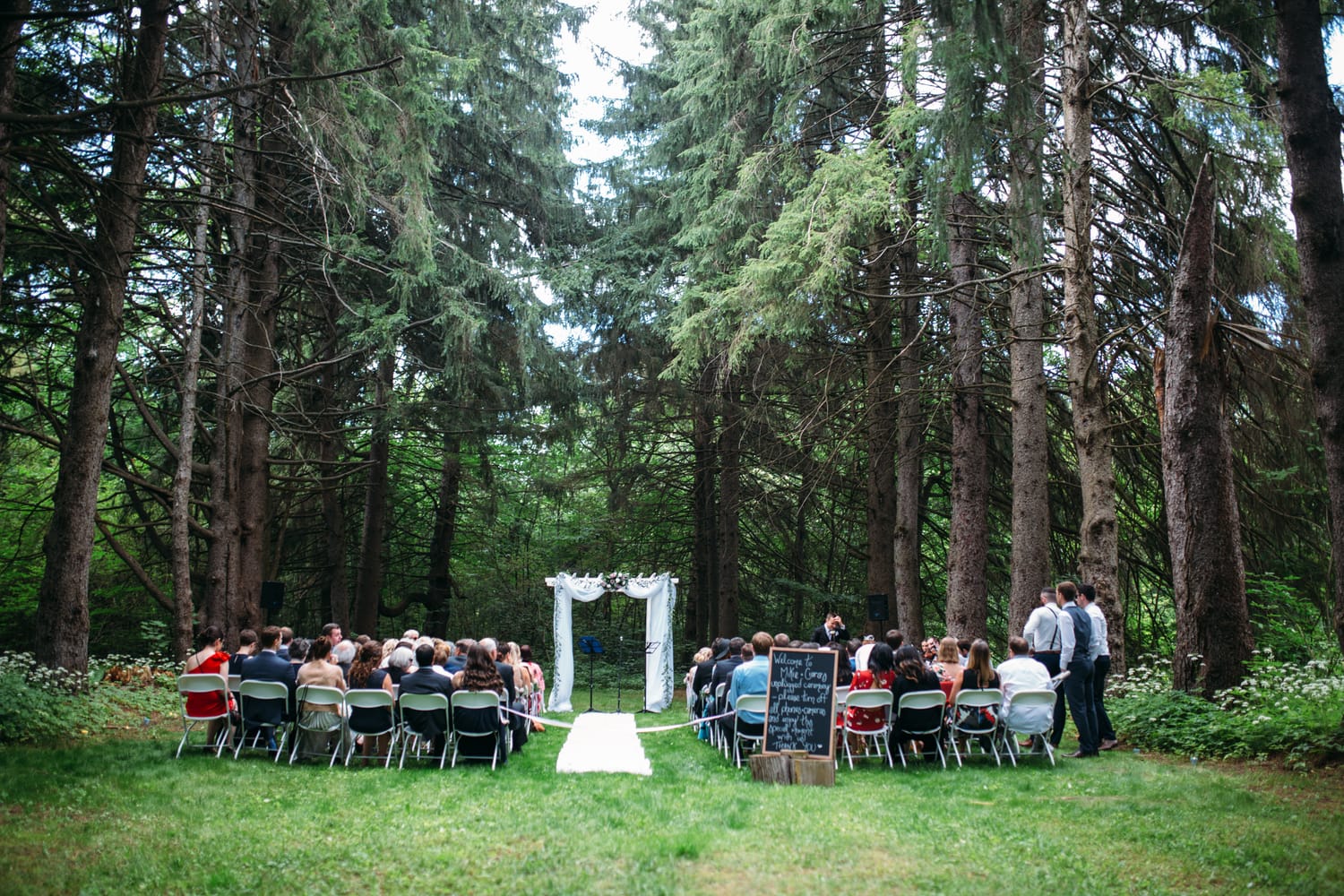 Ciara and Mikie weddings story frame 8: An Ontario wedding near Peterborough, with archive clues pointing to Trent University or Elmhirst Resort and a full reception-to-after-party story..