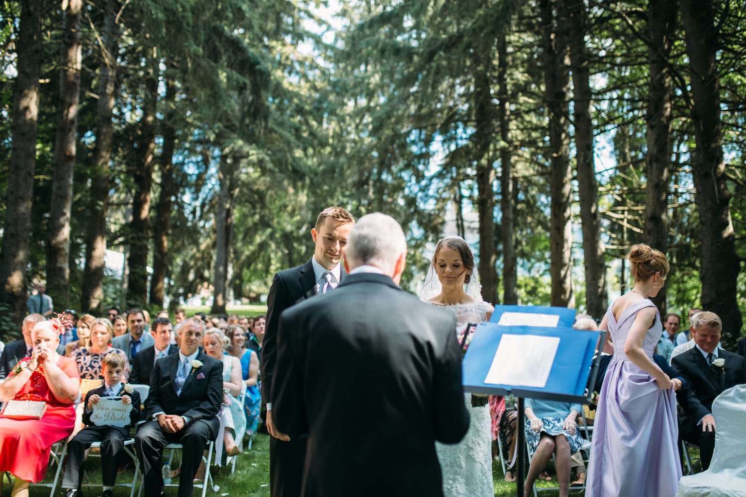 Ciara and Mikie weddings story frame 11: An Ontario wedding near Peterborough, with archive clues pointing to Trent University or Elmhirst Resort and a full reception-to-after-party story..